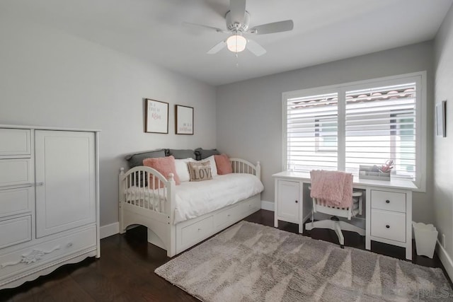 bedroom featuring dark hardwood / wood-style floors and ceiling fan