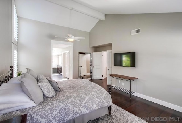 bedroom with ensuite bathroom, high vaulted ceiling, dark wood-type flooring, and beam ceiling