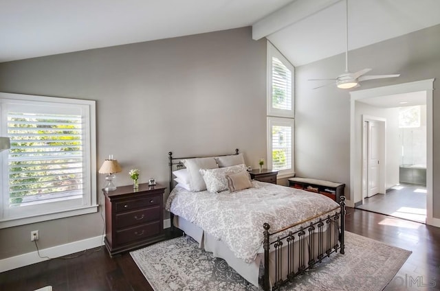 bedroom featuring lofted ceiling with beams, ceiling fan, dark hardwood / wood-style flooring, and ensuite bath