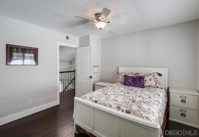 bedroom featuring ceiling fan and dark hardwood / wood-style flooring