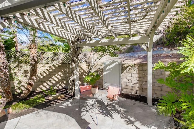 view of patio featuring a pergola