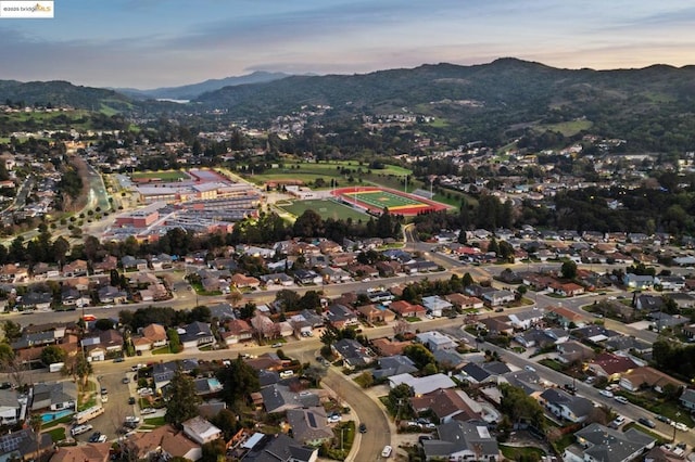 aerial view at dusk with a mountain view