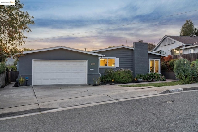 single story home featuring a garage