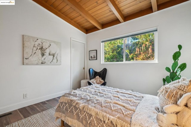 bedroom with wood ceiling, hardwood / wood-style floors, and vaulted ceiling with beams