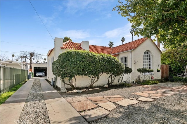 view of property exterior with a garage