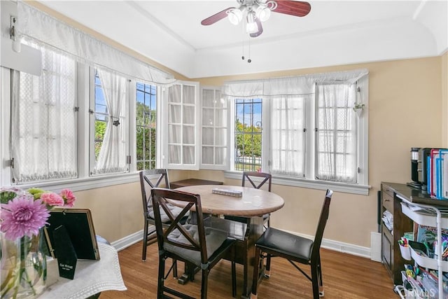 sunroom featuring ceiling fan and a healthy amount of sunlight