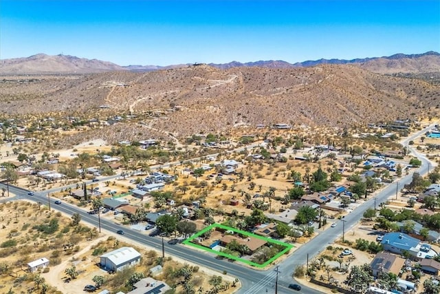 bird's eye view with a mountain view