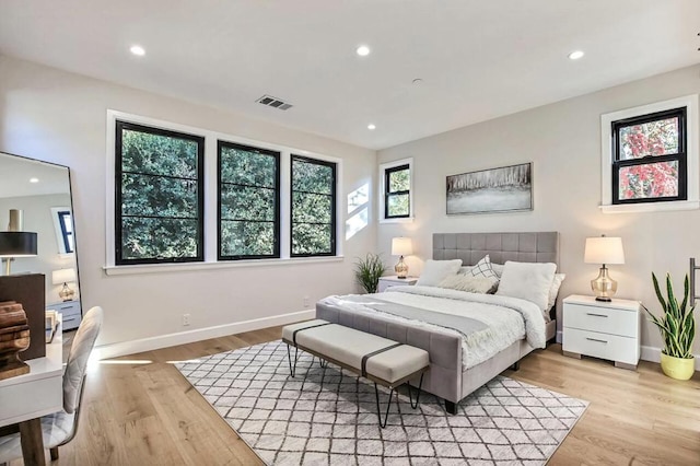 bedroom featuring light hardwood / wood-style flooring