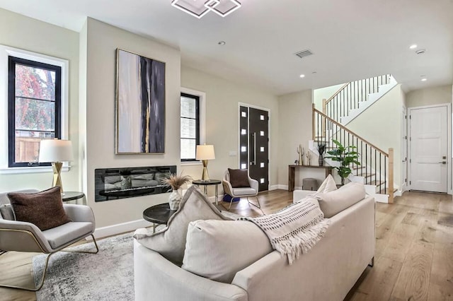 living room with light wood-type flooring