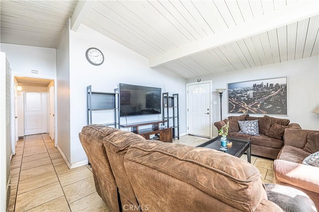 tiled living room with vaulted ceiling with beams