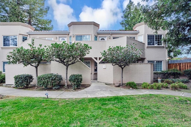 view of front of home with a front yard