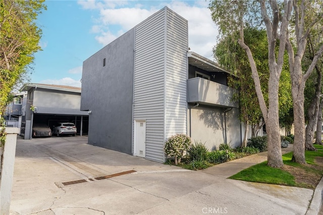 view of side of property featuring a garage