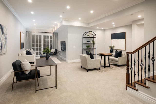 living room featuring light carpet, ornamental molding, and french doors