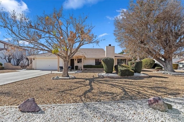 ranch-style home featuring a garage