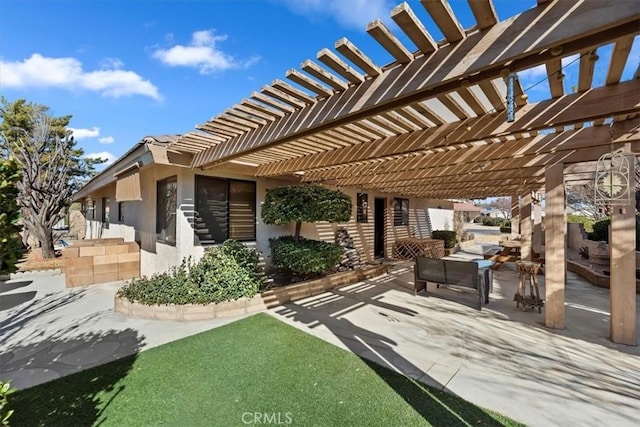 view of patio / terrace featuring outdoor lounge area and a pergola