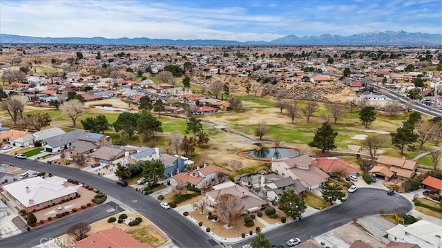 bird's eye view with a mountain view