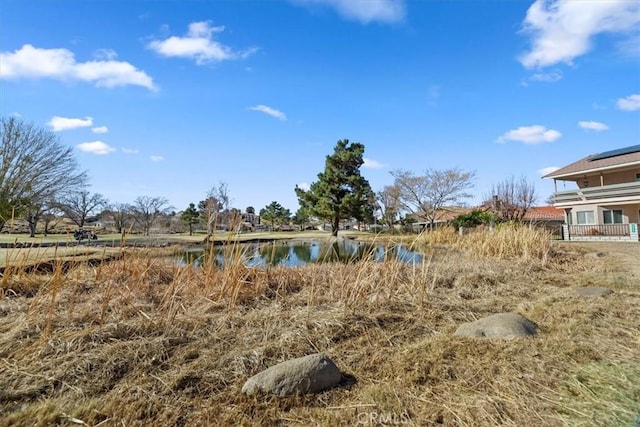 view of yard with a water view