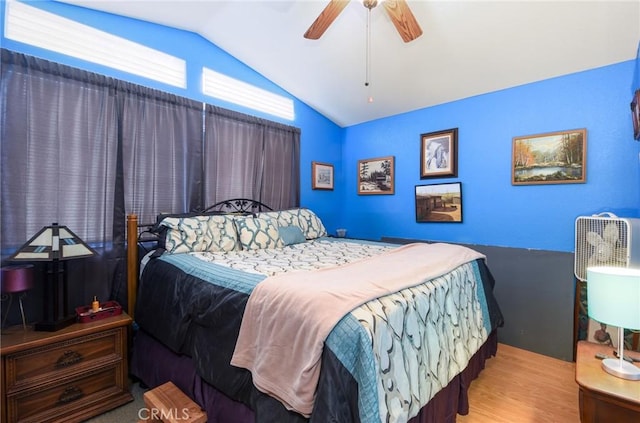 13057 Fescue Ct, Corona, CA 92883 - bedroom featuring lofted ceiling, wood finished floors, and a ceiling fan