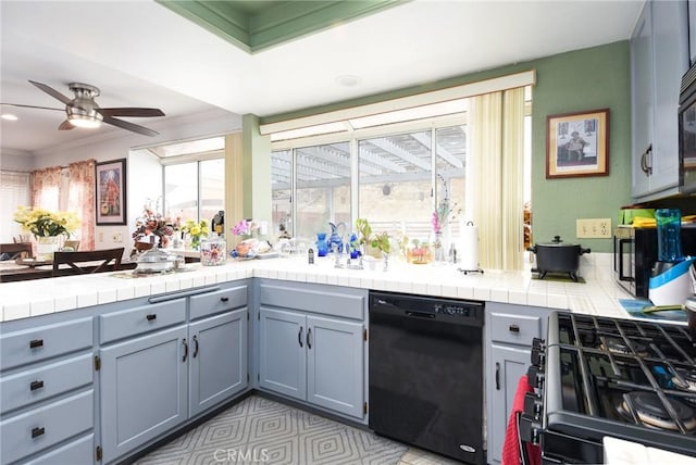 13057 Fescue Ct, Corona, CA 92883 - kitchen featuring dishwasher, ceiling fan, tile countertops, gray cabinets, and ornamental molding