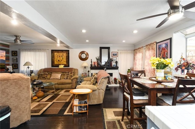 interior space with crown molding, ceiling fan, and dark hardwood / wood-style flooring