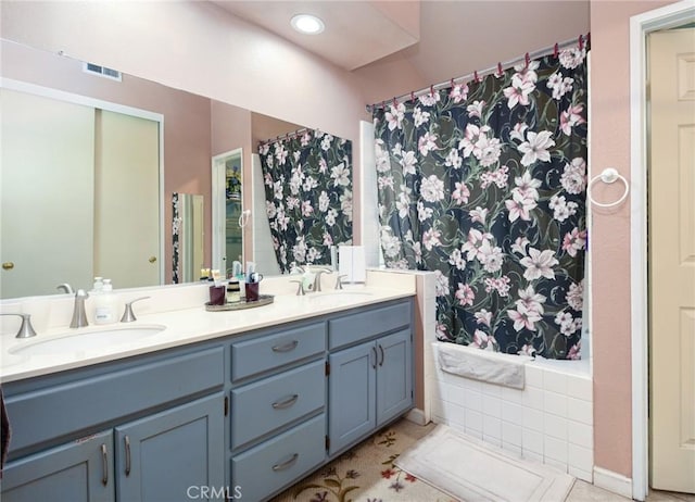 13057 Fescue Ct, Corona, CA 92883 - full bath with double vanity, curtained shower, and a tub