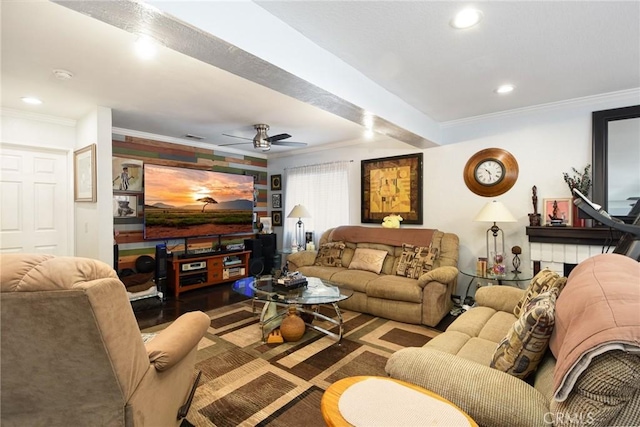 living room with a ceiling fan, crown molding, and recessed lighting