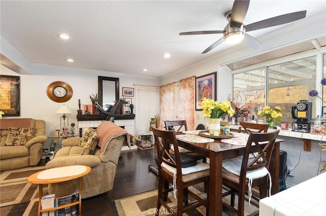 dining space featuring recessed lighting, crown molding, a ceiling fan, and wood finished floors