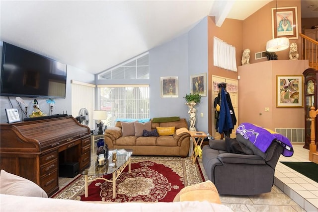 living room featuring tile patterned flooring, visible vents, and high vaulted ceiling