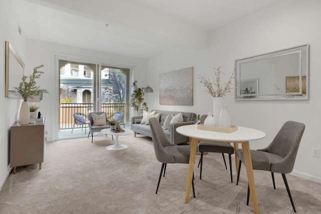 view of carpeted dining area