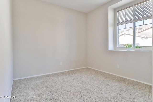 view of carpeted spare room