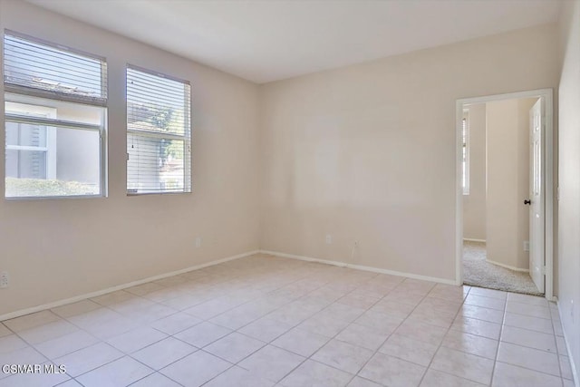 view of tiled spare room