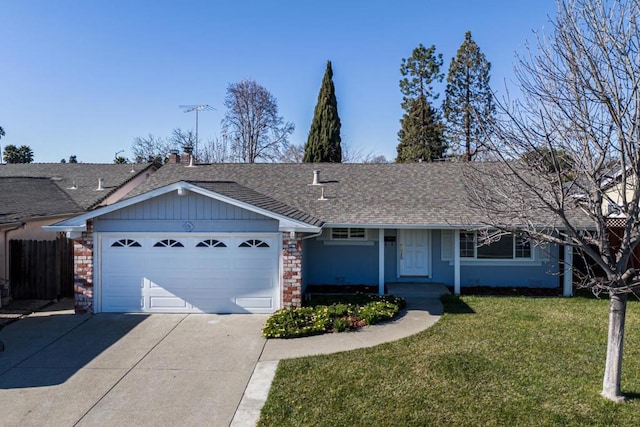 ranch-style house with a garage and a front lawn