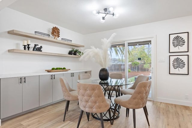 dining space featuring light hardwood / wood-style floors