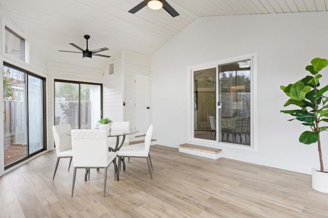 sunroom / solarium with wood ceiling, vaulted ceiling, and ceiling fan