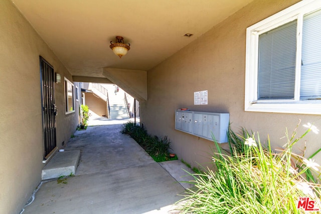 view of patio featuring mail boxes