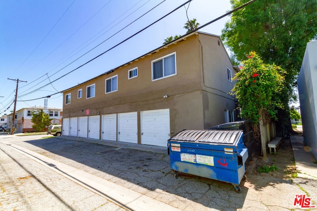 exterior space featuring a garage