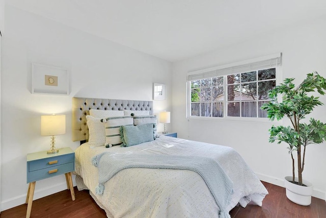 bedroom featuring dark hardwood / wood-style floors