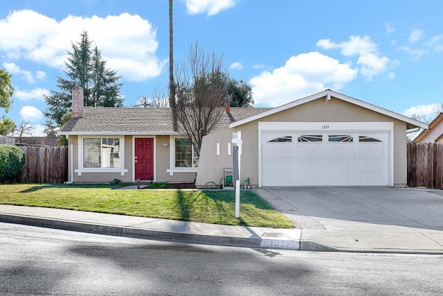 ranch-style house featuring a garage and a front lawn