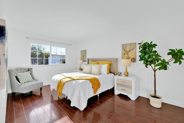 bedroom featuring dark hardwood / wood-style floors