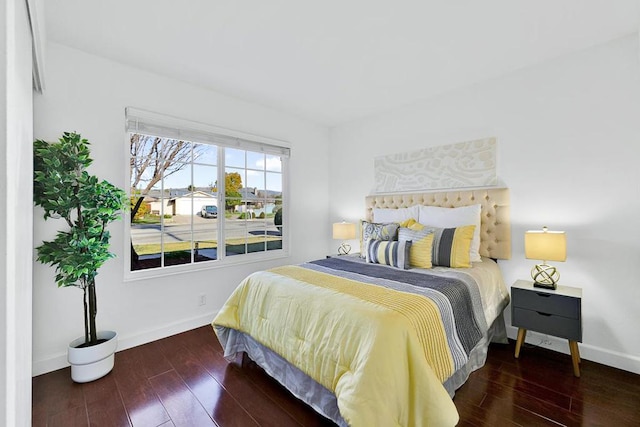 bedroom featuring dark wood-type flooring