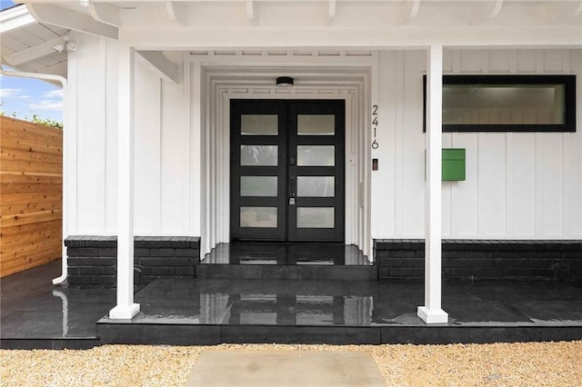 doorway to property featuring french doors