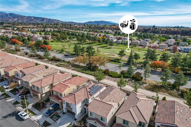 birds eye view of property featuring a mountain view