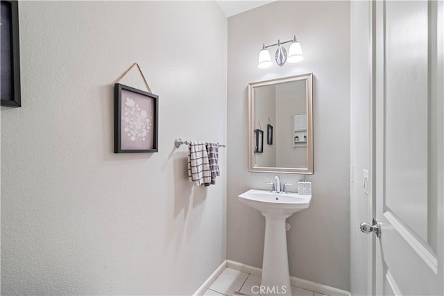 bathroom with tile patterned floors