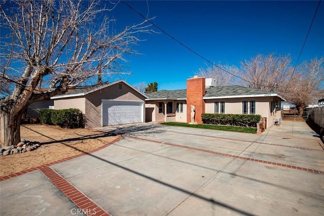 ranch-style home with a garage