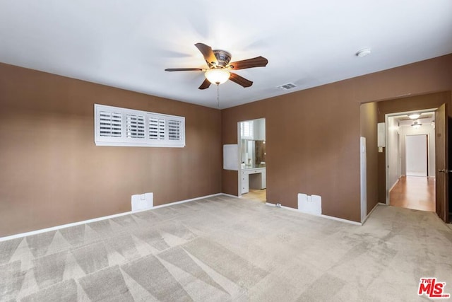 unfurnished bedroom with light carpet and ceiling fan