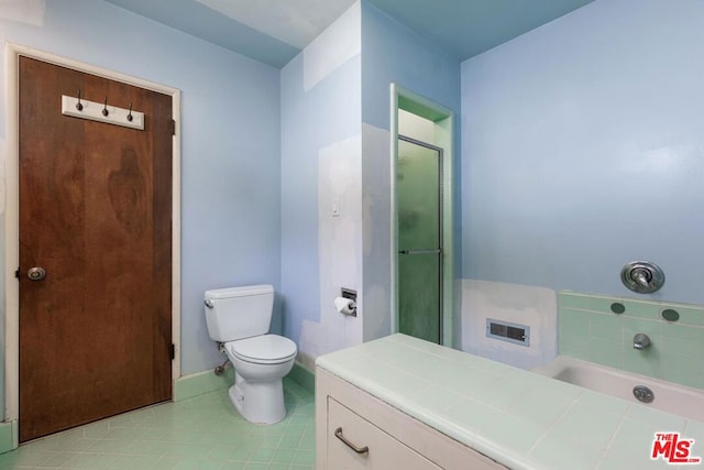 bathroom featuring toilet