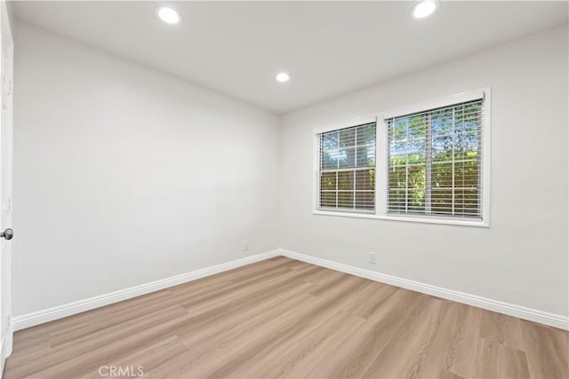 empty room featuring light hardwood / wood-style floors