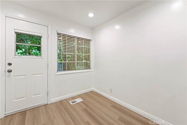 doorway featuring light hardwood / wood-style floors