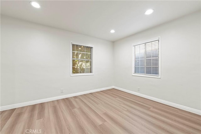 empty room with light wood-type flooring