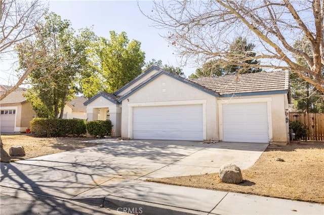 ranch-style home with a garage